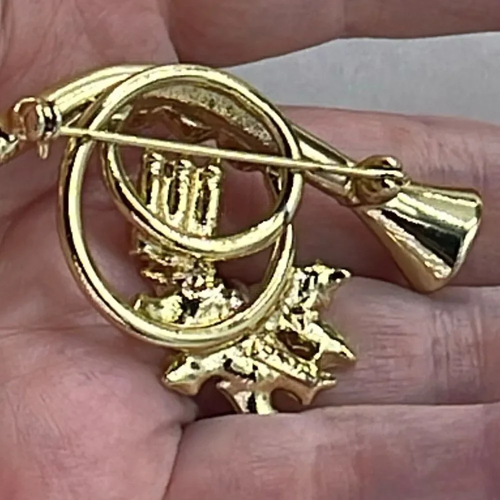 Vintage AGC matte and shiny embellished French Horn brooch.